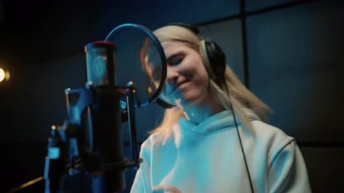 Modern Sound Studio for Recording Music Portrait of Singing Woman Singer Record of Soundtrack