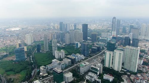 Arranha-céu e paisagem urbana, Jacarta na Indonésia. Avançado aéreo