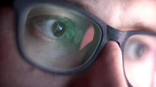 Close Up View of Focused Businessman Wears Computer Glasses