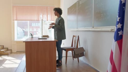 Modern Math Teacher At Work In College