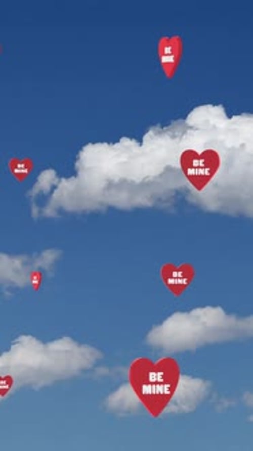 Vertical Video Valentines Day Be Mine Flying Candy Hearts in Sky