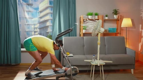 Man Works Out on Treadmill at Home