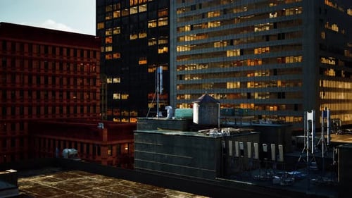 A View of a City at Night From the Roof of a Building