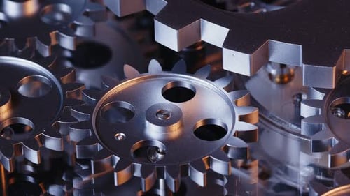 Silver Gears Interlocking in Macro Close Up