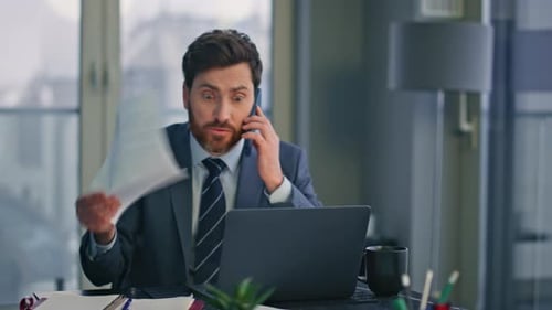 Stressed Man Talking Angrily On The Phone