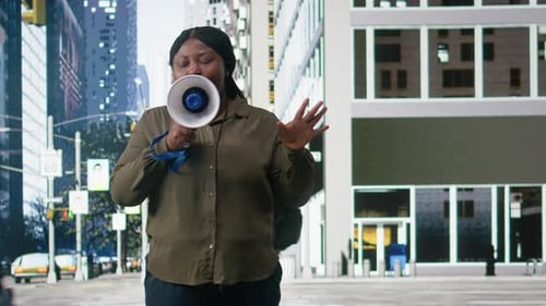 African American Woman Using Megaphone for Urban Crowd Passing By