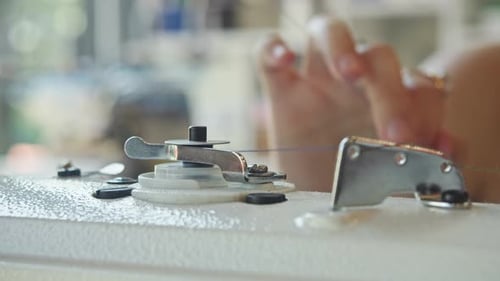 Close Up of Sewing Machine Mechanism in Action