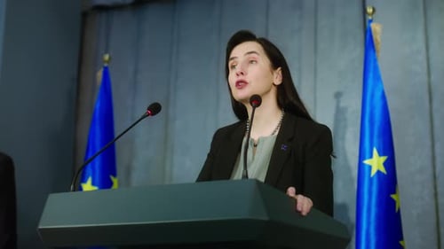 Female Representative of the European Union Pronounces Political Speech