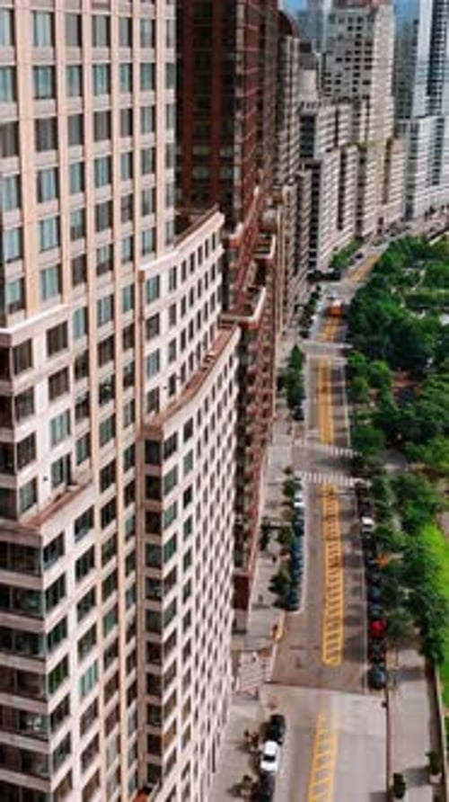 Drone footage close to the buildings at waterfront of Hudson River. New York from top.