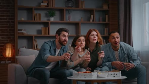 Friends Watch Sports Game at Home Cheering