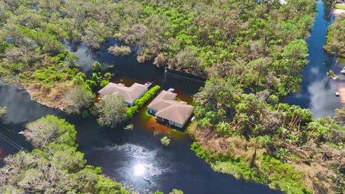 Heavy Flood with High Water Surrounding Residential Houses After Hurricane Ian Rainfall in Florida