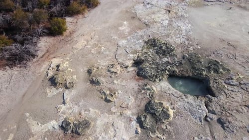 Bubbling Volcanic Lake mud pools. Geyser in geothermal volcanic park, New Zealand. drone.