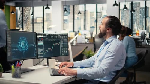 Day Trader in Office Leverages AI Analytics to Interpret Candlestick Charts