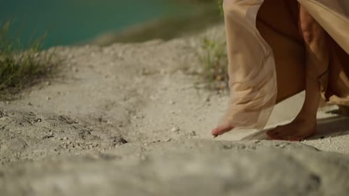 Girl Walks Barefoot on Rocky Terrain Near Turquoise Waters Bare Feet of Person Walking on Rocky