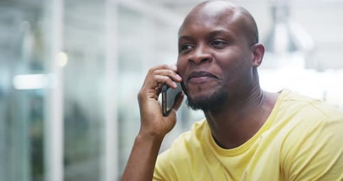 Man Talking on Cell Phone in Urban Setting