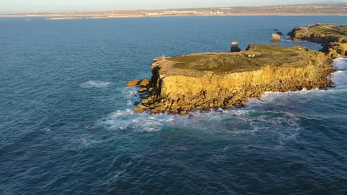 Drone Stay and Approach High Cliffs and Sea Waves at Sunset Portugal