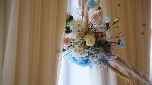 Wedding Decor Flower Bouquets and Compositions in Restaurant Hall with Blue White Roses Petals