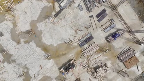 Aerial View Concrete Pouring Into Foundation for Building Structure