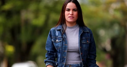 Surprised Woman Reacts to News in a Park