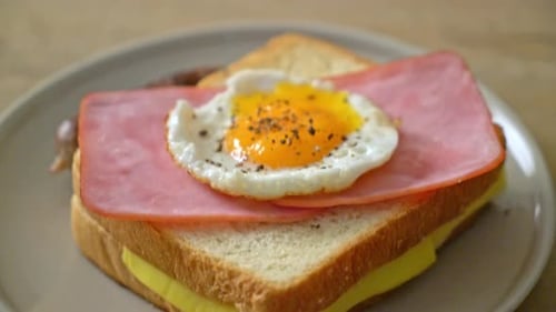 Breakfast Sandwich with Fried Egg, Ham, and Cheese