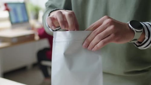 Delivery Service Worker Packing Small Parcel