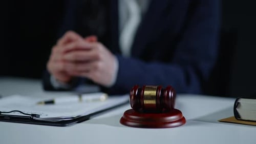 Gavel and Sound Block in Courtroom Setting