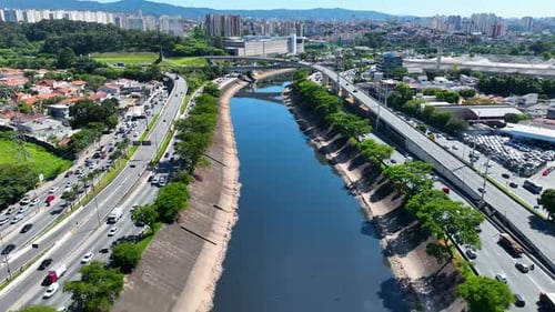 Cityscape of rush traffic jam at freeway road. Transportation scenery.