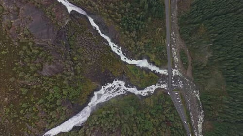 Latefossen rushing through cliffs in wild nature of Scandinavia