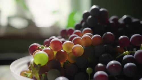 Bowl of Fresh Grapes in Sunny Kitchen