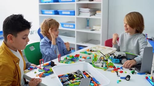Robotics Programming Class Children Construct and Code Robot STEM Education Using Constructor