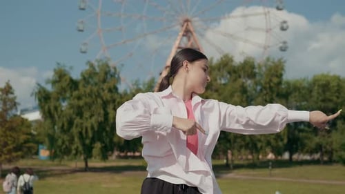 Girl Dancer Dancing Energetic Dance on the Street in Urban Atmosphere
