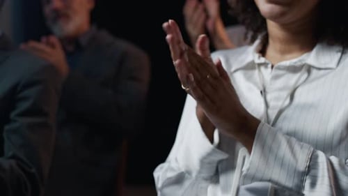 People Applauding At Conference
