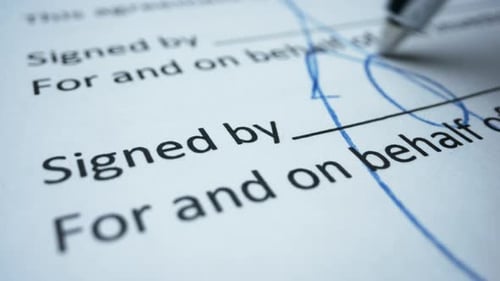Macro of Business Person Signing Contract. Unrecognizable Worker Signing Document With
