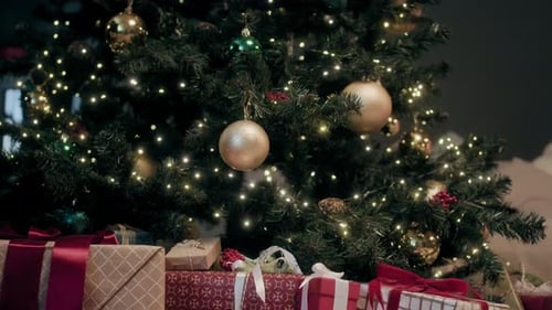 Festive Christmas Tree with Gifts at Home