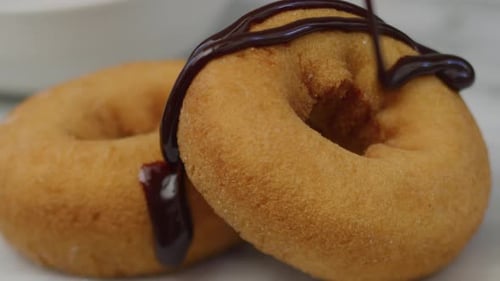 Pouring Chocolate on Doughnut Redk