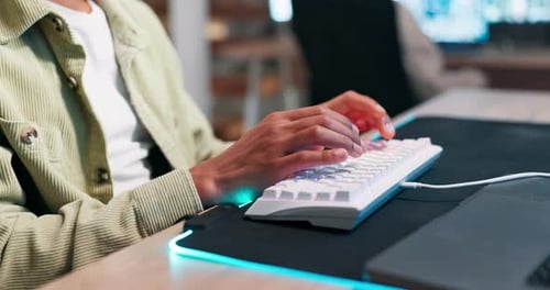 Hands, keyboard or typing with productivity in office on neon mousepad or connection for computer