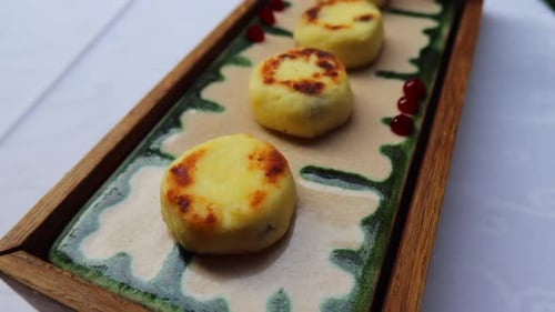 Pastries on Tray with Jam and Cream close-up
