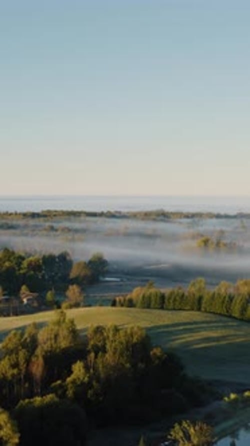 Picturesque Rural Landscape with Fog at Sunrise Aerial View