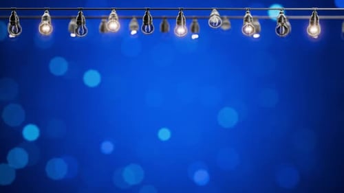 Festive Flickering String Lights with Blue Bokeh Background