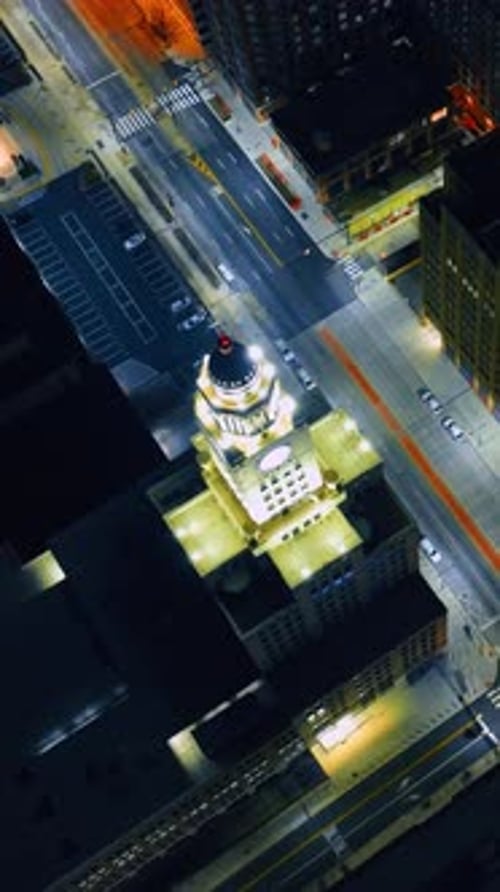 View of the City Hall tower and well-lit street in front of it in Philadelphia, Pennsylvania, USA.