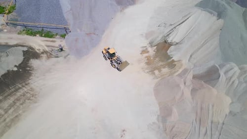 Wheel Loader Carrying Gravel Aerial Shot