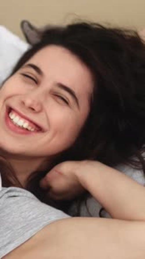 Smiling Woman Relaxing Indoors With Gentle Touch