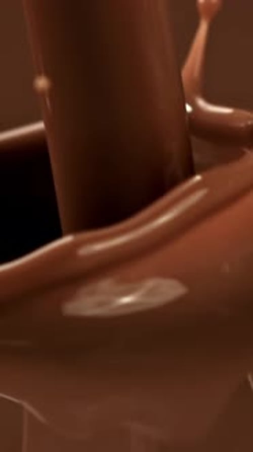 Super Slow Motion Splashes of Liquid Dark Chocolate Filmed on a Highspeed Camera at 1000 Fps