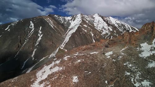 Mountain Ranges with Snowy Peaks View Drone