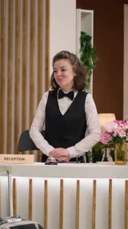 Vertical Video Check in Process at Hotel Reception