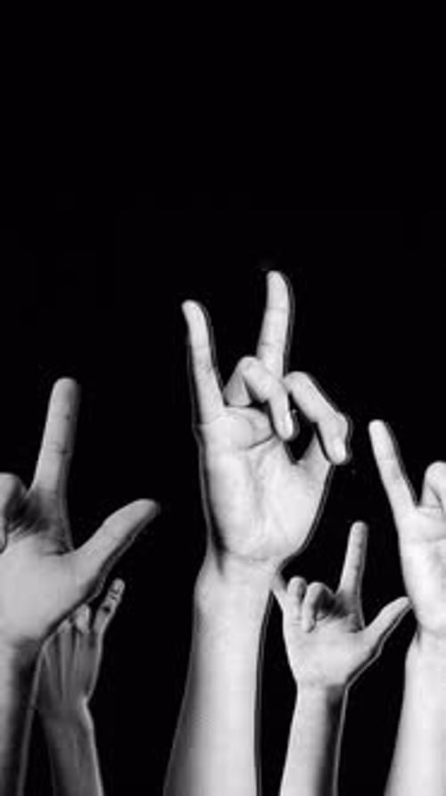 Spinning Halftone Rock Symbol Hands Portrait Background Loop