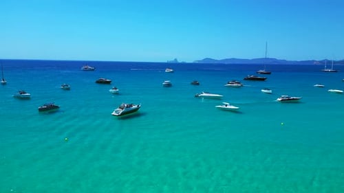 Formentera Pristine rocky Coastline and azur water. Wonderful aerial view flight drone