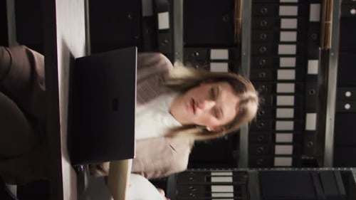 Woman Working at Desk in Bright Modern Office