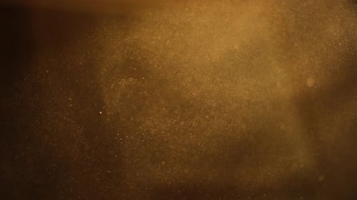 Shimmering Golden Dust Particles Floating in Magical Space