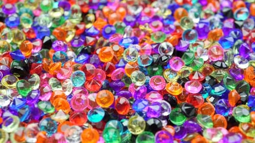 An Abundance Of Rotating Colored Clear Acrylic Diamonds Bridal Party Mirror Beads.